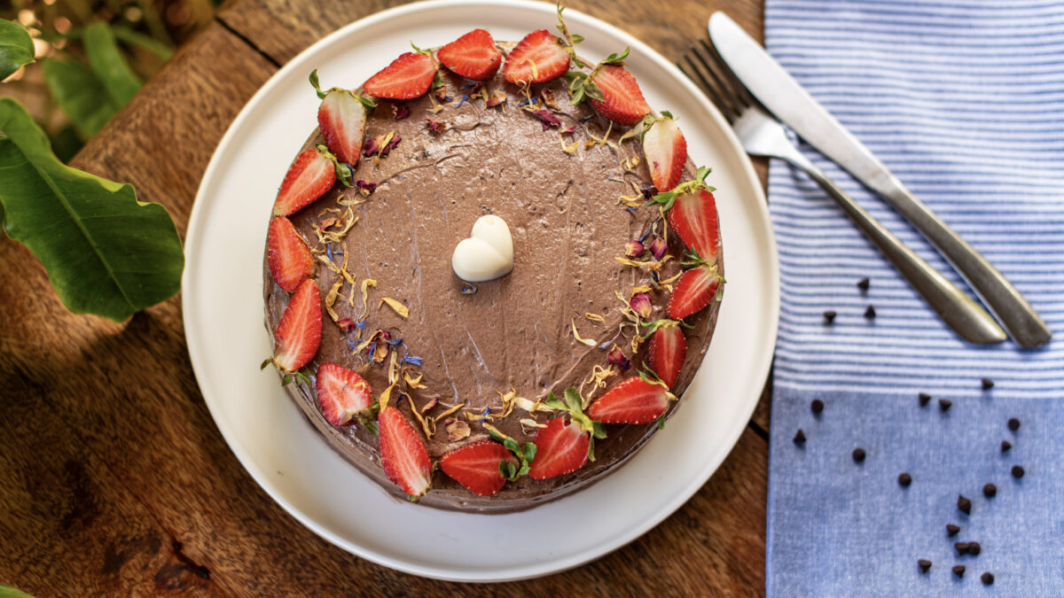 Chocolate cake topped with fresh strawberries, made at Indigo Vibe Cafe in Kilifi