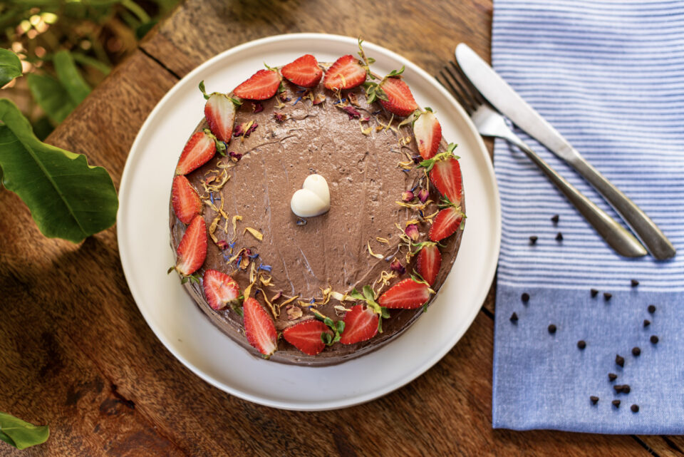 Chocolate cake topped with fresh strawberries, made at Indigo Vibe Cafe in Kilifi