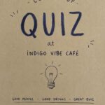 Hand-drawn poster announcing an upcoming quiz night at Indigo Vibe Cafe