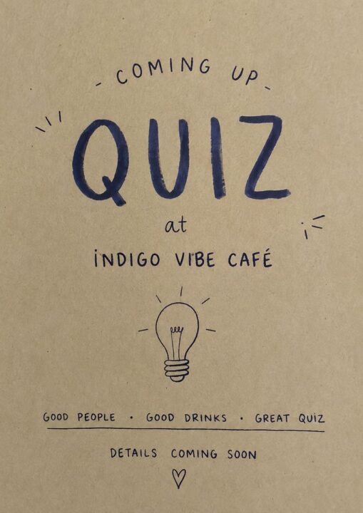 Hand-drawn poster announcing an upcoming quiz night at Indigo Vibe Cafe